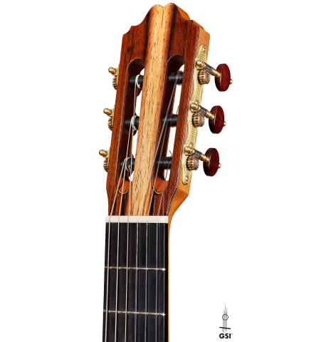 The headstock of a 2013 Andres Marvi classical guitar made of cedar and CSA rosewood