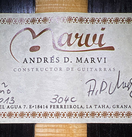 The label of a 2013 Andres Marvi classical guitar made of cedar and CSA rosewood