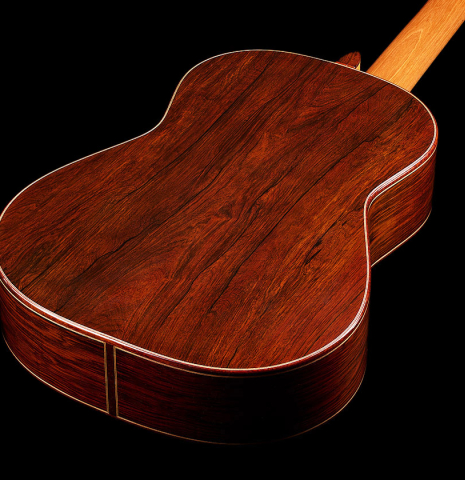 The back and sides of a 2013 Andres Marvi classical guitar made of cedar and CSA rosewood