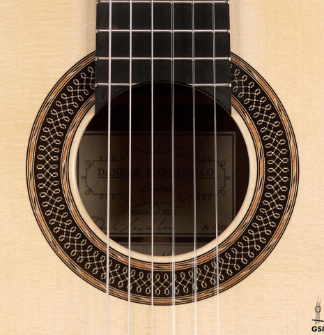 The rosette of a 2020 Daniele Marrabello "A Nina" classical guitar made of spruce and Indian rosewood