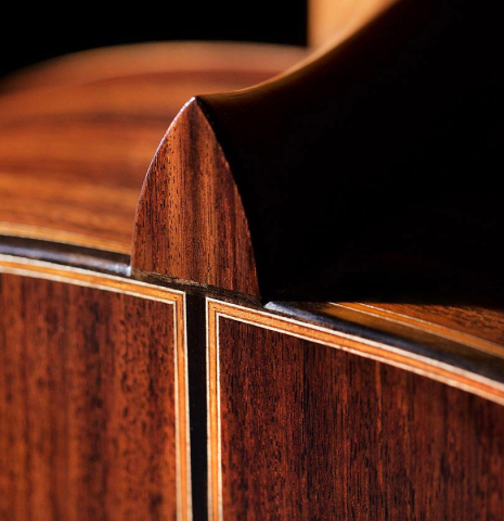 The heel, back binding and purfling of a 2020 Daniele Marrabello "A Nina" classical guitar made of spruce and Indian rosewood