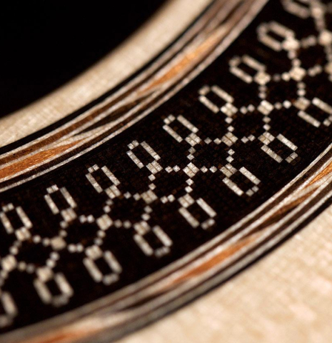 The rosette detail of a 2020 Daniele Marrabello "A Nina" classical guitar made of spruce and Indian rosewood