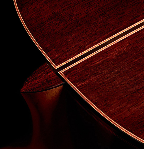 A heel of made of Indian rosewood made of a a 2022 Daniele Marrabello guitar