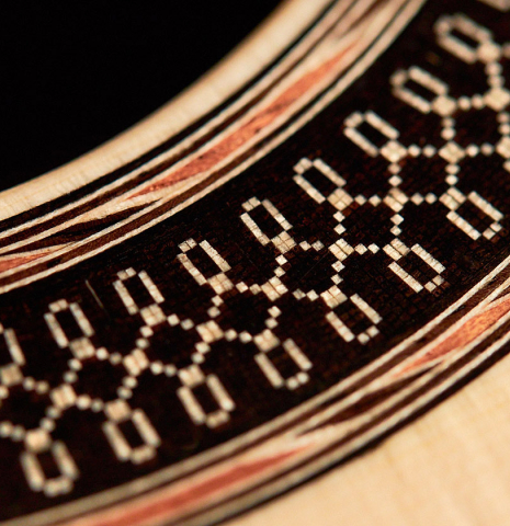 A detailed rosette of a 2022 Daniele Marrabello guitar with spruce soundboard and Indian rosewood back and sides