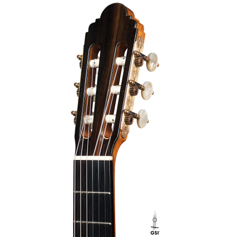 The headstock of a 1994 Paco Santiago Marin classical guitar made of cedar and Indian rosewood