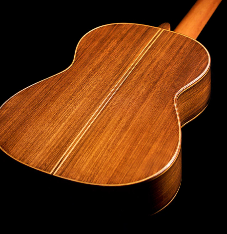 The back and sides of a 1994 Paco Santiago Marin classical guitar made of cedar and Indian rosewood