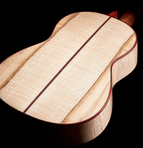 The back and sides of a 2023 Lucas Martin #100 classical guitar made with spruce top and maple back and sides.