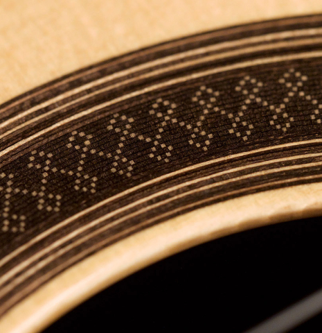 Detail of the rosette of a 2021 Antonio Marin Montero classical guitar made of spruce and Indian rosewood