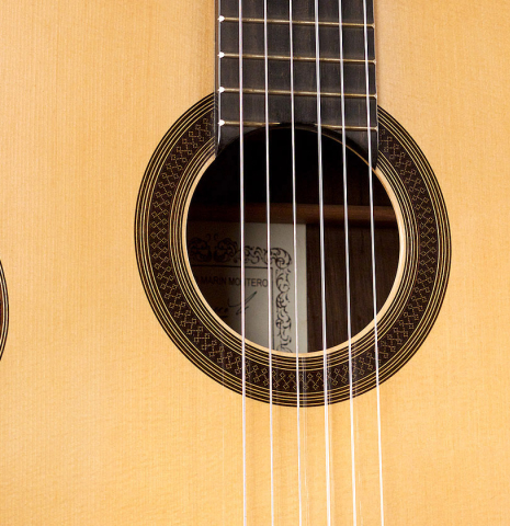 The soundboard of a 2005 Antonio Marin Montero classical guitar made of spruce and CSA rosewood