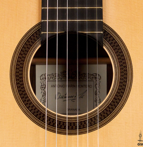 The rosette of a 2005 Antonio Marin Montero classical guitar made of spruce and CSA rosewood