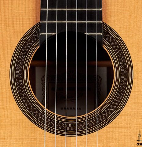 The rosette of a 1998 Antonio Marin Montero Spanish classical guitar made with spruce and CSA rosewood.