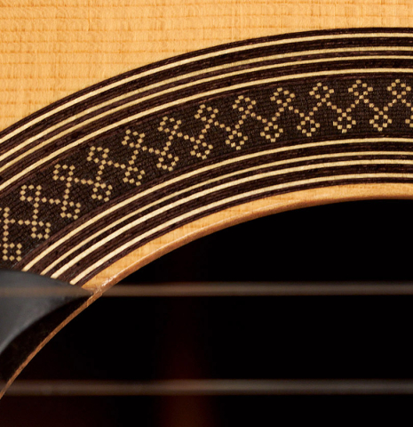 The rosette of a 1998 Antonio Marin Montero Spanish classical guitar made with spruce and CSA rosewood.