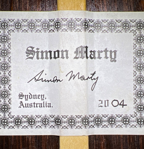 The label of a 2004 Simon Marty classical guitar made with spruce and CSA rosewood.