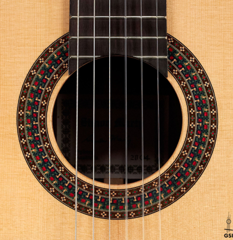 The rosette of a 2004 Simon Marty classical guitar made with spruce and CSA rosewood.