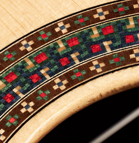 The rosette of a 2004 Simon Marty classical guitar made with spruce and CSA rosewood.