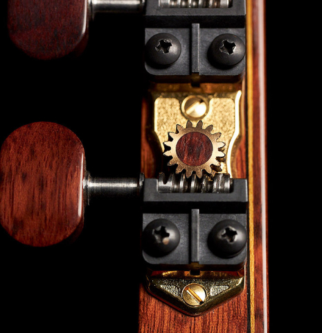 The machine heads of a 2004 Simon Marty classical guitar made with spruce and CSA rosewood.