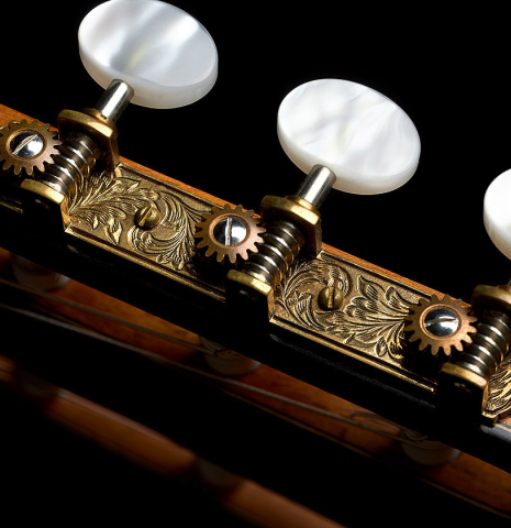 The tuning machines of a 2001 Paco Santiago Marin classical guitar made of spruce and CSA rosewood