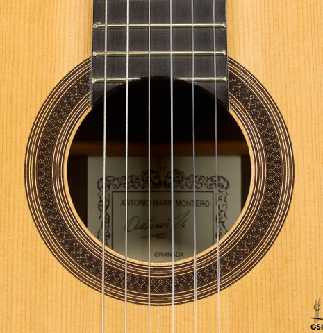 The rosette of a 2004 Antonio Marin Montero classical guitar made of spruce and CSA rosewood