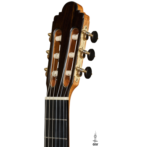 The headstock of a 2021 Paco Santiago Marin "50th Anniversary" classical guitar made of spruce and Indian rosewood