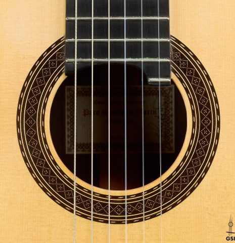 The rosette of a 2021 Paco Santiago Marin "50th Anniversary" classical guitar made of spruce and Indian rosewood