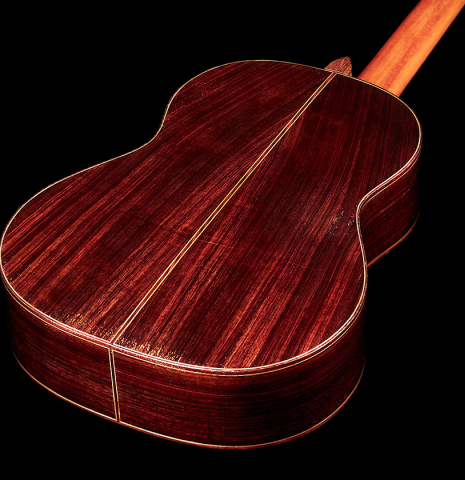 The back of a 2013 Robert Mattingly "Posthumous" classical guitar made of spruce and Indian rosewood