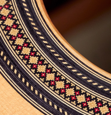 The rosette of a 2013 Robert Mattingly &quot;Posthumous&quot; classical guitar made of spruce and Indian rosewood