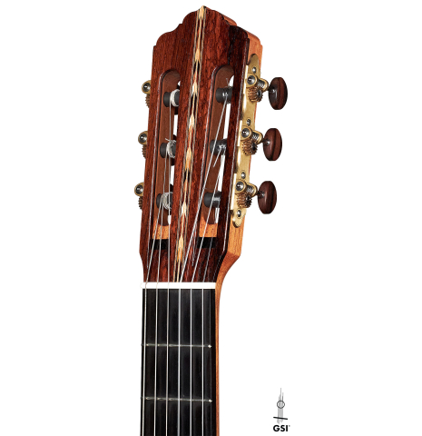 The headstock of a 2021 Claudio Meneghelli  "Hommage to Jose Romanillos" classical guitar made with spruce and Indian rosewood