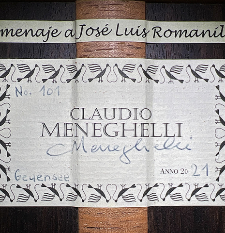 The label of a 2021 Claudio Meneghelli  "Hommage to Jose Romanillos" classical guitar made with spruce and Indian rosewood