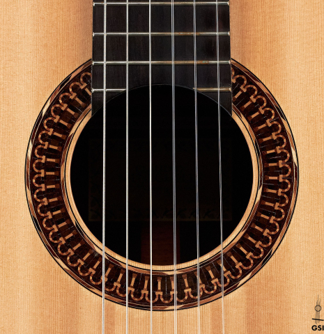 The rosette of a 2021 Claudio Meneghelli  "Hommage to Jose Romanillos" classical guitar made with spruce and Indian rosewood