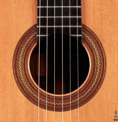 The rosette of a 1953 Edgar Monch classical guitar made with spruce and Indian rosewood.