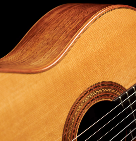 The soundboard and side of a 1953 Edgar Monch classical guitar made with spruce and Indian rosewood.