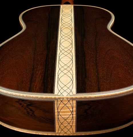 This is the back and sides at the foot of a 2002 Rafael Moreno Rodriguez "Sueno" classical guitar made with cedar and CSA rosewood