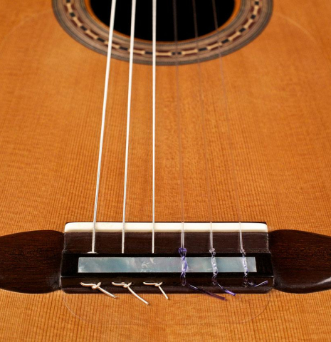 This is the bridge, tie-block and saddle of a 2002 Rafael Moreno Rodriguez "Sueno" classical guitar made with cedar and CSA rosewood