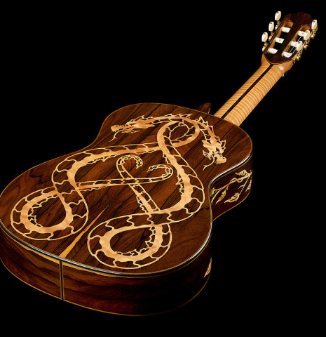 The back and sides of a 2002 Matthew Morello classical guitar made of spruce and ziricote