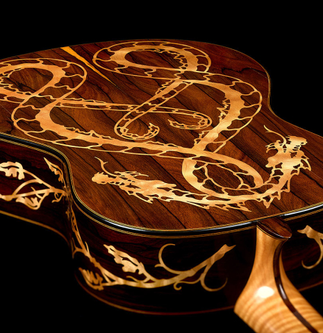 The heel, back and side inlays of a 2002 Matthew Morello classical guitar made of spruce and ziricote