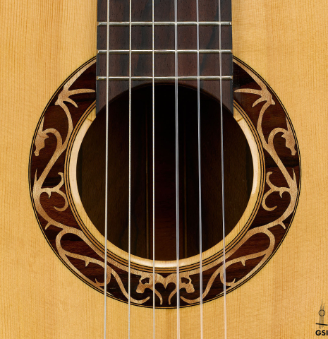 The rosette of a 2002 Matthew Morello classical guitar made of spruce and ziricote