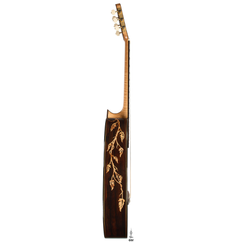 The side of a 2002 Matthew Morello classical guitar made of spruce and ziricote