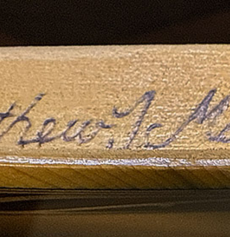 The signature under the soundboard of a 2002 Matthew Morello classical guitar made of spruce and ziricote
