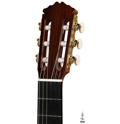 The headstock of a 2023 Fernando Moreno classical guitar made of spruce and Indian rosewood