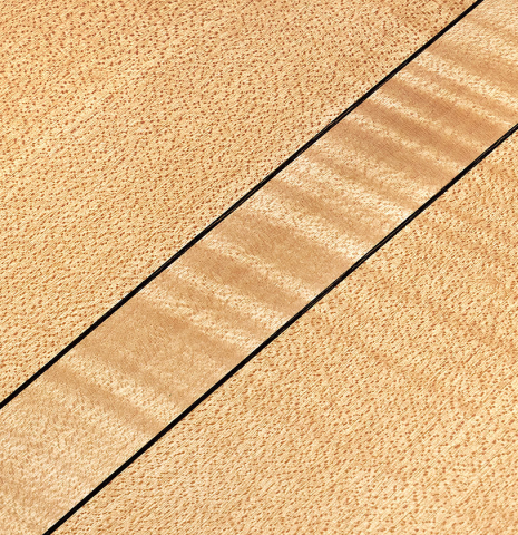 Detail of the back center strip of a 2011 Rafael Moreno Rodriguez classical guitar made of spruce and maple