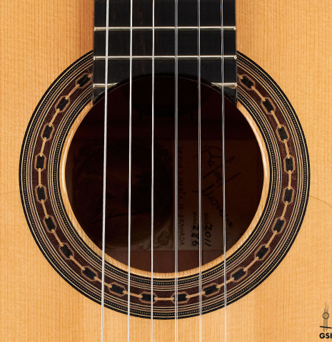 The rosette of a 2011 Rafael Moreno Rodriguez classical guitar made of spruce and maple
