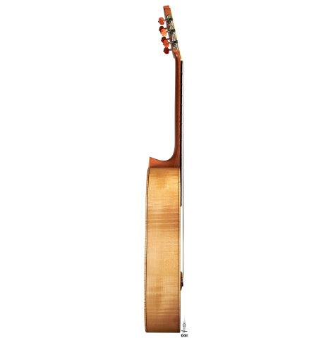 The side of a 2011 Rafael Moreno Rodriguez classical guitar made of spruce and maple