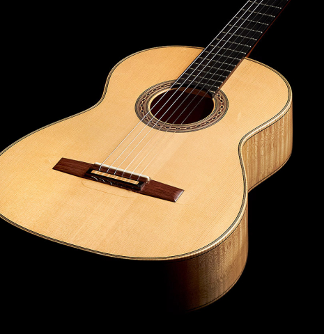The soundboard of a 2011 Rafael Moreno Rodriguez classical guitar made of spruce and maple