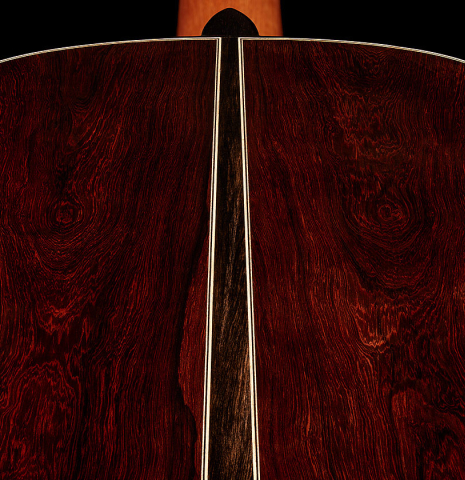 The back center seam of a 2025 Oscar Munoz classical guitar made of cedar and African rosewood