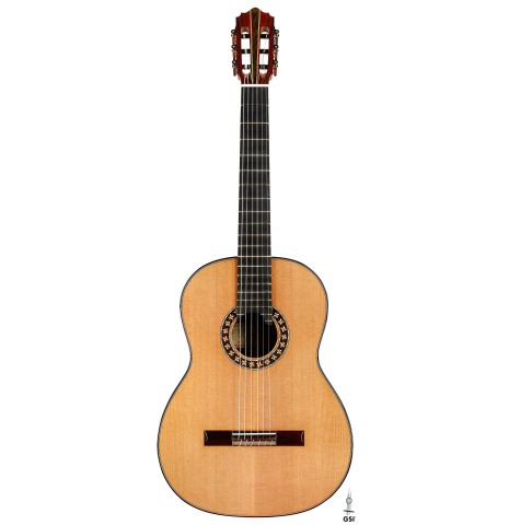 The front of a 2025 Oscar Munoz classical guitar made of cedar and African rosewood