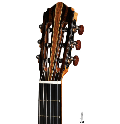 The headstock of a 2024 Oscar Munoz classical guitar made of spruce and Makassar ebony