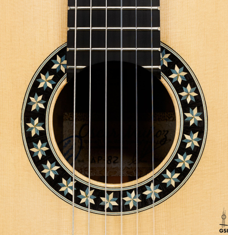 The rosette of a 2024 Oscar Munoz classical guitar made of spruce and Makassar ebony