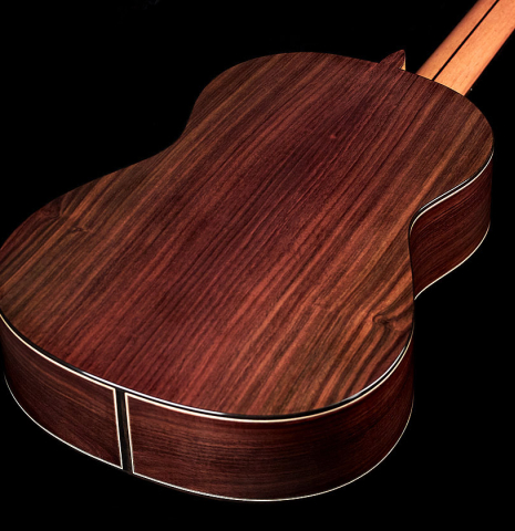 The back of a 2022 Miguel Angel Gutierrez classical guitar made of spruce and Indian rosewood.