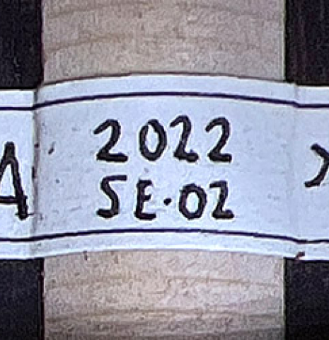 The label of a 2022 Miguel Angel Gutierrez classical guitar made of spruce and Indian rosewood.