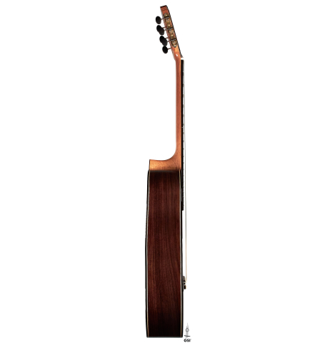 The side of a 2022 Miguel Angel Gutierrez classical guitar made of spruce and Indian rosewood.